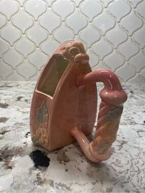 Hull Pottery Pink and Yellow Sunglow
Sad Iron Wall Pocket